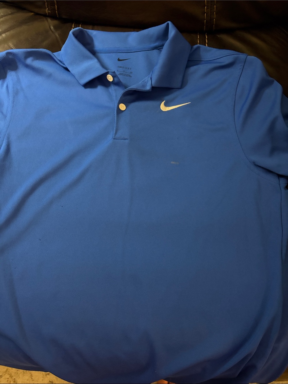 Nike Men’s Royal Blue Polo with White Swoosh
